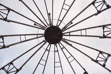 Metallic iron sphere structure. Big building. Rusty beams. Abstract shape symbol.