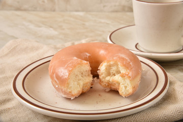 Donut and a cup of coffee
