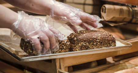 Fresh bread on the counter in the store, close-up .