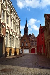 Fototapeta na wymiar Old cobbles street in the city of Bruges