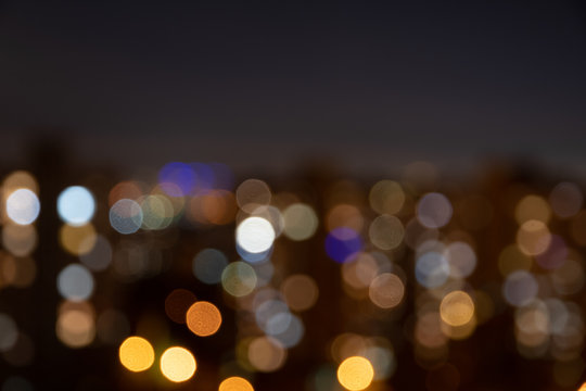 Blurred multi-colored lights of the night city