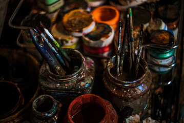 a lot of paint in the artist’s workshop 3