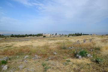 Antique ruins and limestone blocks in Hierapolis, Turkey. Ancient city.