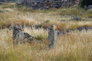Antique ruins and limestone blocks in Hierapolis, Turkey. Ancient city.