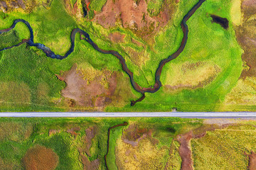 Aerial view on road in Iceland. Aerial landscape above highway in the geysers valley. Icelandic landscape from air. Famous place. Travel - image