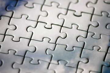 Blank puzzle with blue or white tint