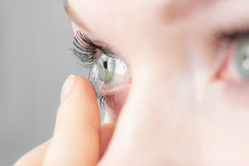 girl wearing soft contact lenses close-up macro