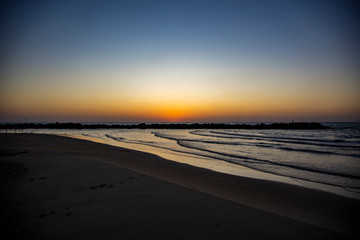 The beach ,the sun sets ,the Sunset.
