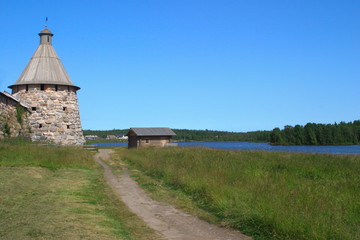 Arkhangelsk tower of the Solovetsky Kremlin and Holy lake. Russia