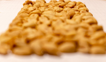 Salty peanut isolated on white background