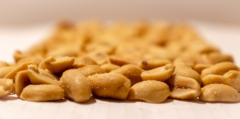 Salty peanut isolated on white background