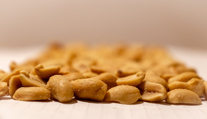 Salty peanut isolated on white background