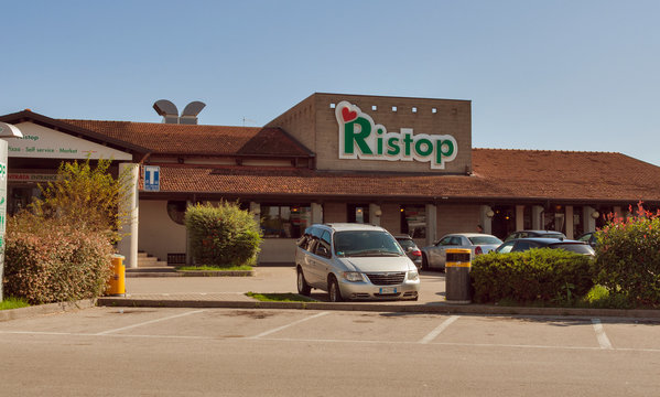 Parked cars in front of Ristop cafe open for different travellers in Cessalto, Italy. Airest is an Italy based food and retail operator with over 200 points of sale in 10 countries.