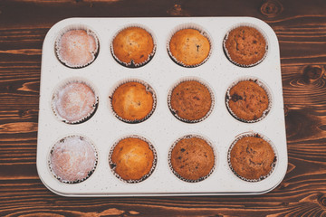 12 sweet baked muffins in a mold