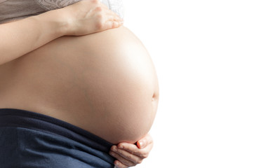 pregnant woman, expectant mother on white background, close-up of pregnant belly, activity during pregnancy, copy space
