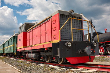 Fototapeta na wymiar vintage steam train hurtling at speed along the rails, retro vehicle, steam engine