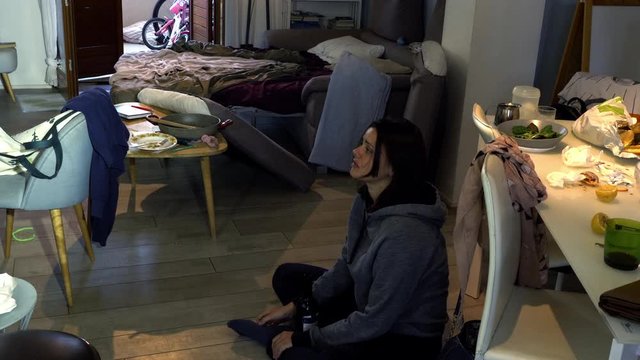 Woman crying at home lost and depressed