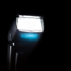flash while working on a dark background, photo equipment, external flash