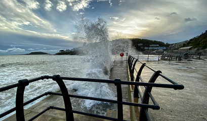 Waves hitting the sea defences at Looe, South East Cornwall 