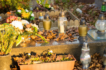 Candles and flowers at the cemetery