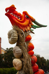 Hand-made decor with pumpkins figures of animals. Pumpkin dragon on halloween with nobody