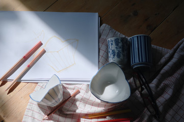 The ceramic designer has designed on paper