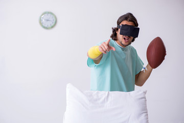 Young man staying in hospital in transfusion concept