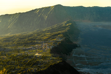 The village near the Bromo vocano group is covered with beautiful fog in the morning.