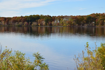 Fototapeta na wymiar Picture of the Horn Pond in Woburn, Massachusetts in the beginning of the fall