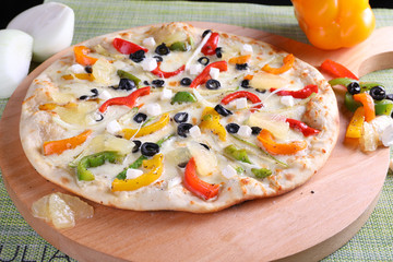 pizza with tomatoes and mozzarella