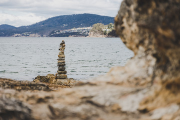 pebbles and rocks in relaxing zen inspiring stack on the beach in Australia