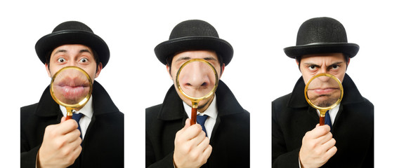 Sherlock Holmes with magnifying glass isolated on white