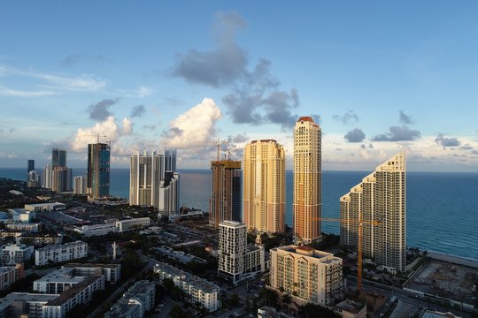 Aerial view of seascape sunset. Sunny Isles, Miami, United States. Great landscape. Vacation travel. Tropical travel. © ByDroneVideos