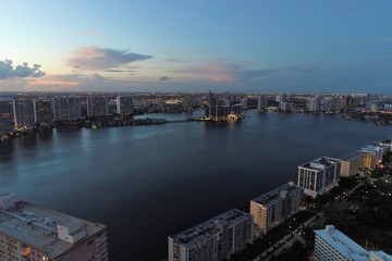 Obraz premium Aerial view of seascape sunset. Sunny Isles, Miami, United States. Great landscape. Vacation travel. Tropical travel.