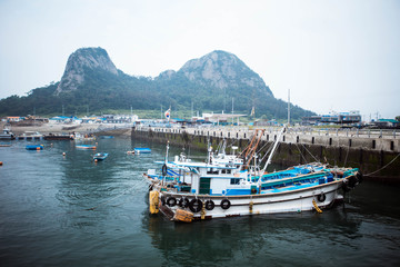 Fototapeta na wymiar a boat docked in the Cheongsam Island, South Korea