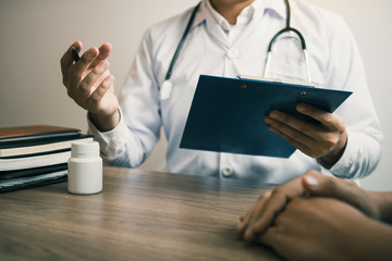 Doctor talking to the patient about menopause and treatment in future.