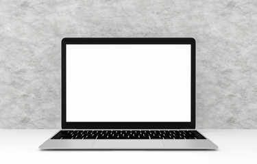 Laptop with blank screen on white table and cement background, 3d rendering