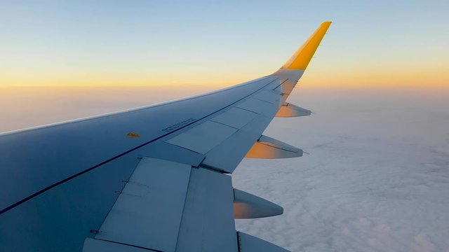 Plane windows view of sunset