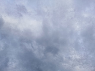 The sky is cloudy, rain is falling. A stratocumulus cloud belongs to a genus-type of clouds characterized by large dark.