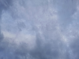 The sky is cloudy, rain is falling. A stratocumulus cloud belongs to a genus-type of clouds characterized by large dark.