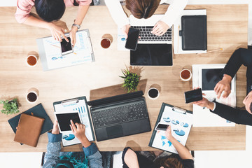 Top view of businessman executive in group meeting with other businessmen and businesswomen in...