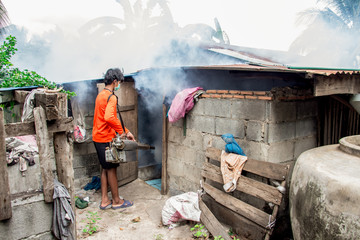 A man use fumigation mosquitoes machine for kill mosquito carrier of Zika virus and dengue fever...