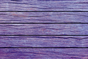 Naklejka premium purple or violet wood background texture