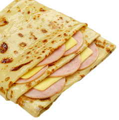 Pancake with cheese and sausage isolated on white