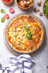 Homemade quiche lorraine with chiken, mushrooms, cheese. top view. Cooking. Spices, butter.  Tart.