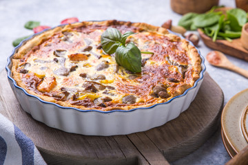 Homemade quiche lorraine with chiken, mushrooms, cheese. top view. Cooking. Spices, butter.  Tart.