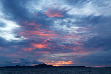 Sea pink sunset. Beautiful color clouds.