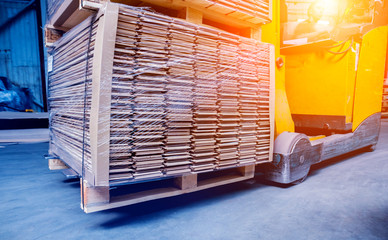 Forklift loader in storage warehouse ship yard. Distribution products. Delivery. Logistics. Transportation.