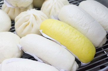 Steamed stuff buns hot in big pot at local fresh market,Chinese food,appetizer,Chinese new year for wealthy,Salapao