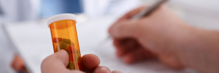 Female doctor hold in arms pad offering © H_Ko